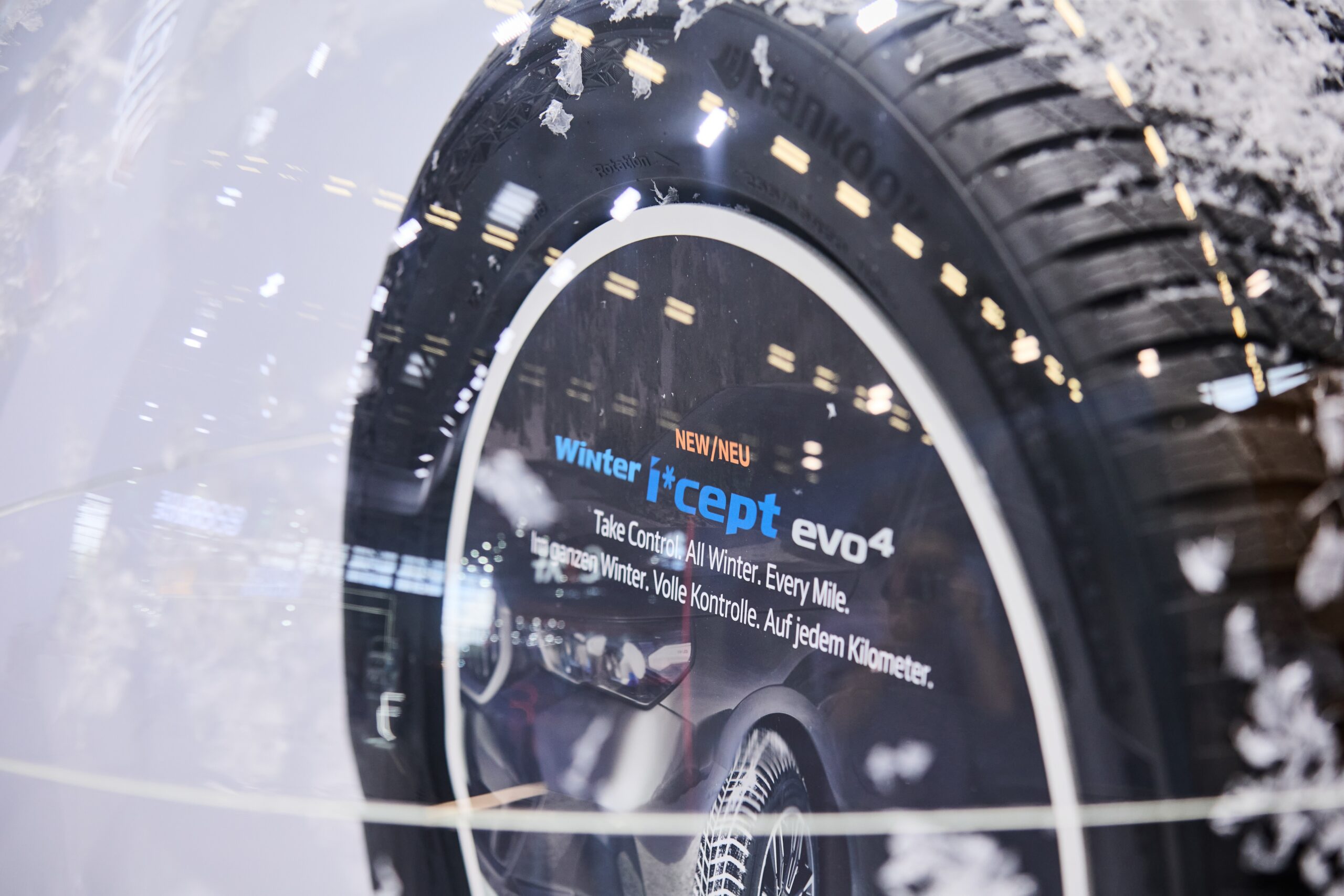 Hankook Winter i*cept evo 4 fitted on a car driving on a snowy road